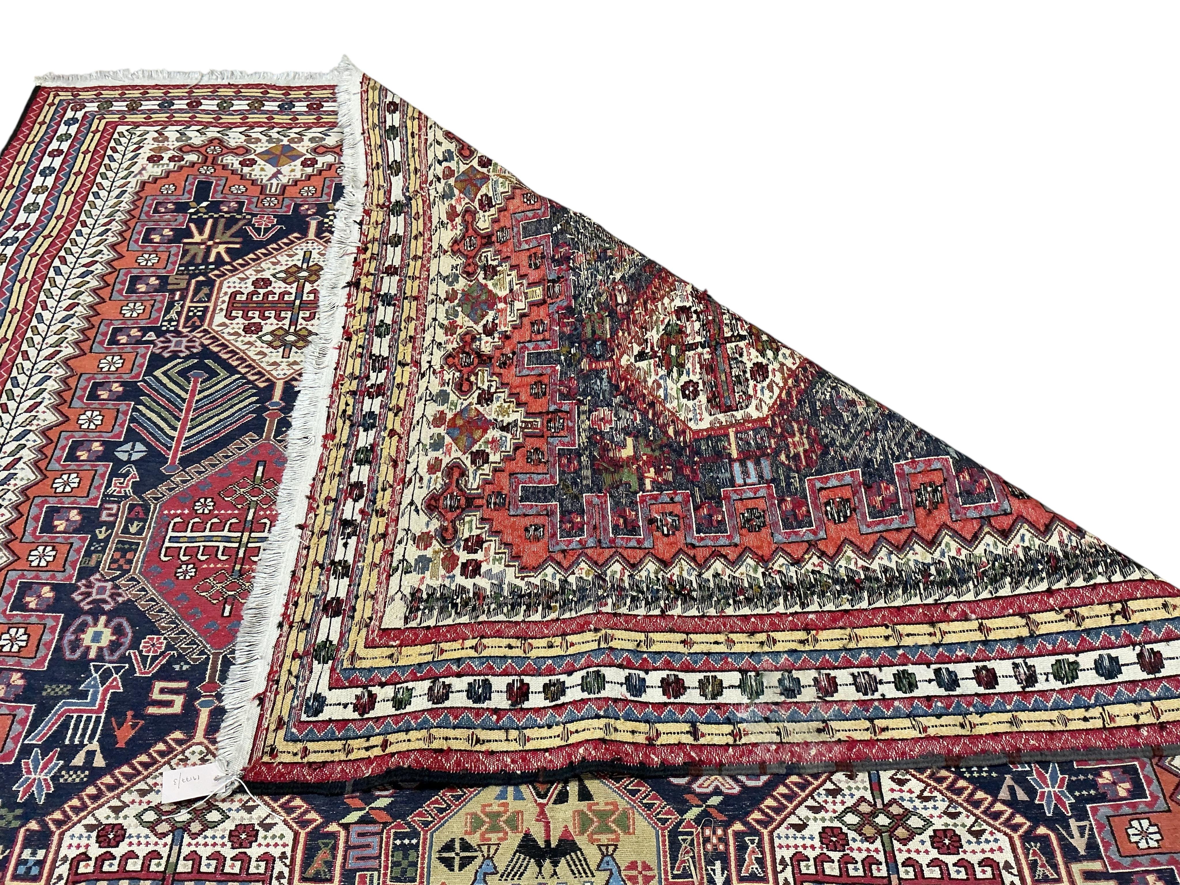 A Soumak blue ground carpet, 300 x 200cm